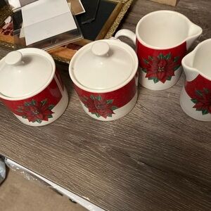 Christmas’s poinsettia serving dishes by Oneida.   Very nice condition.